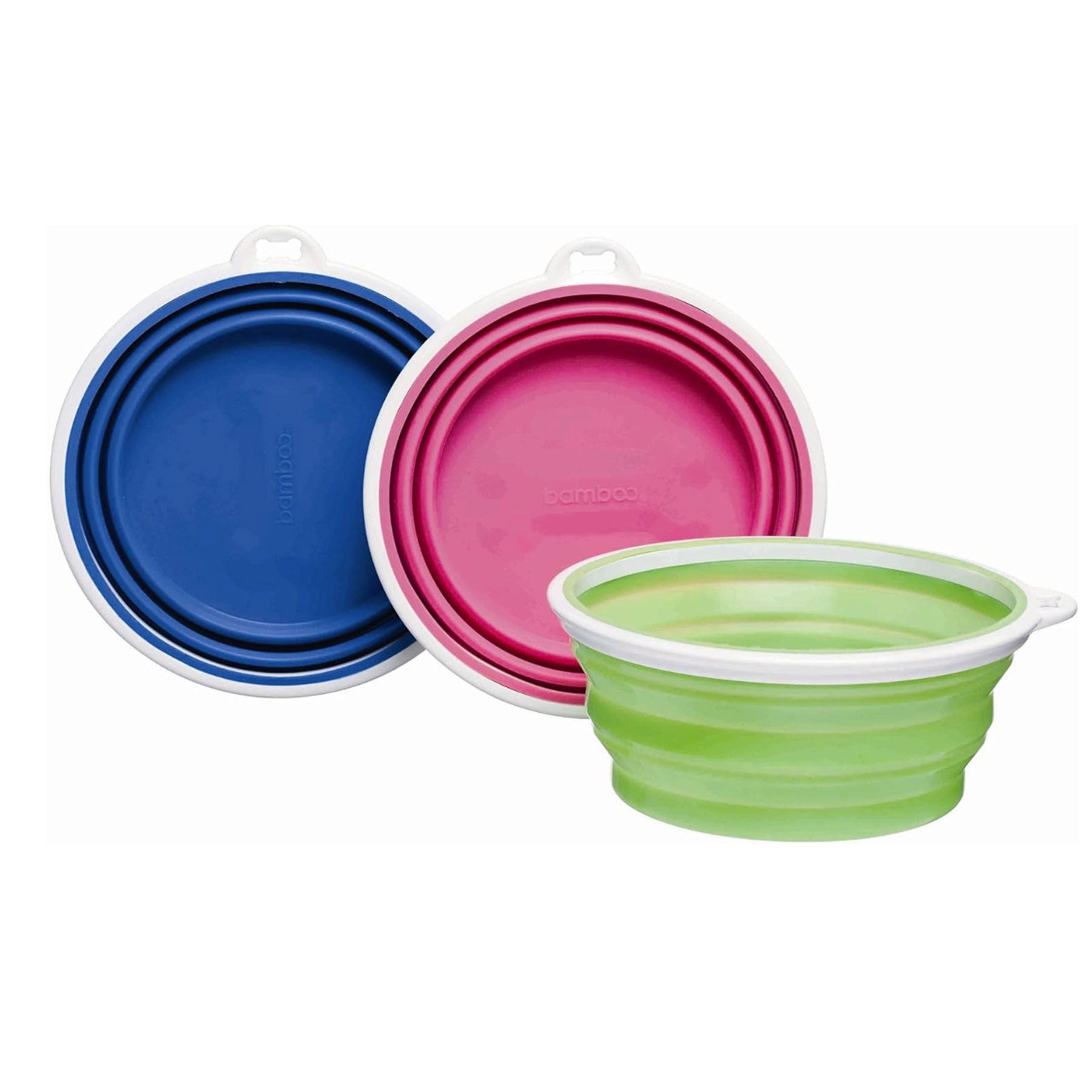 The Pet-mates Bamboo Silicone Travel Bowls by Pet-mates come in a set of three collapsible bowls in blue, pink, and green. Each has a white rim, a stackable design with the green expanded and others nested flat behind. Convenient for travel and dishwasher safe for easy cleaning.