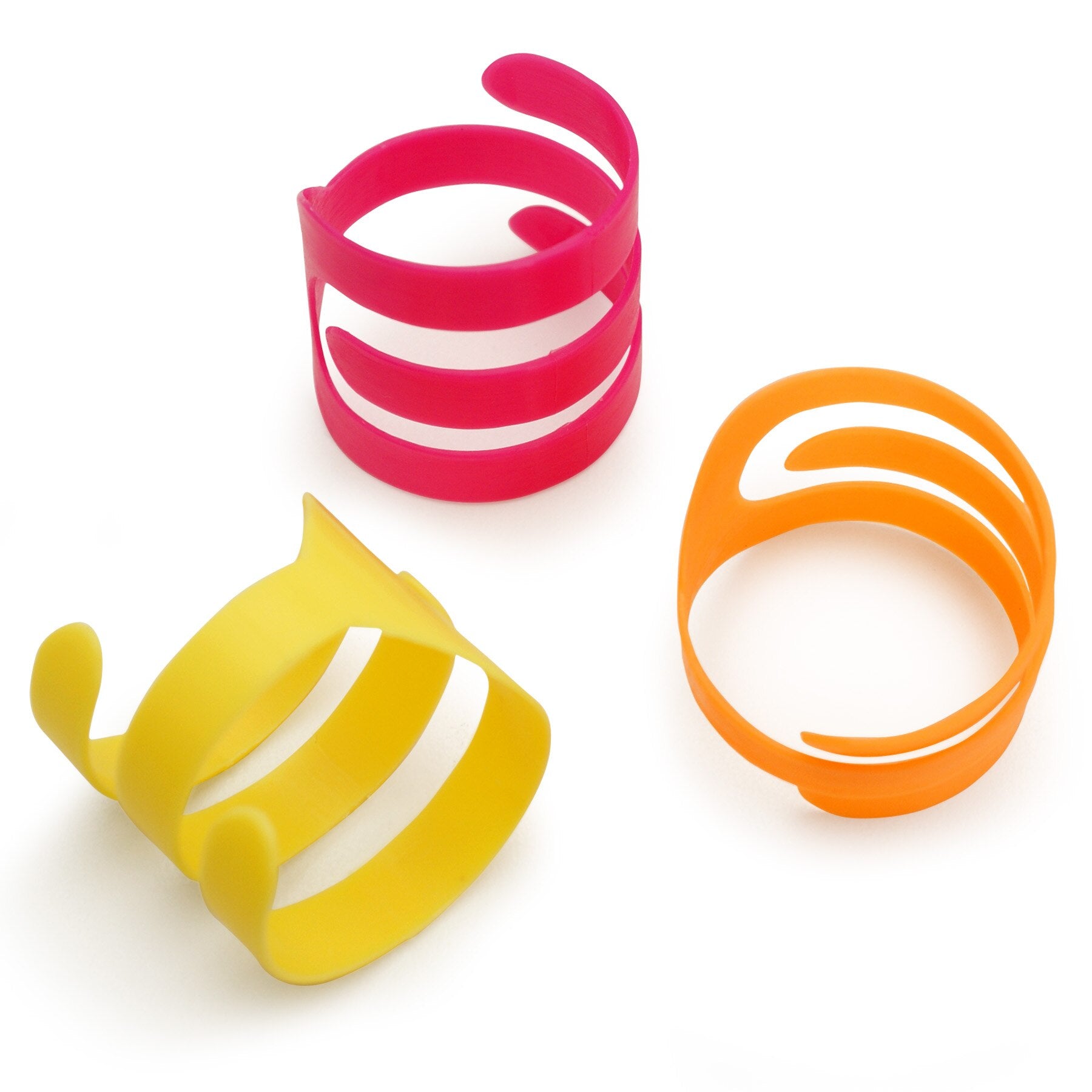A white background displays three vibrant, flexible Pet-mates Looney Loops cat toys. These open-ended rings, in modern curved designs, feature bright neon colors: red, yellow, and orange.