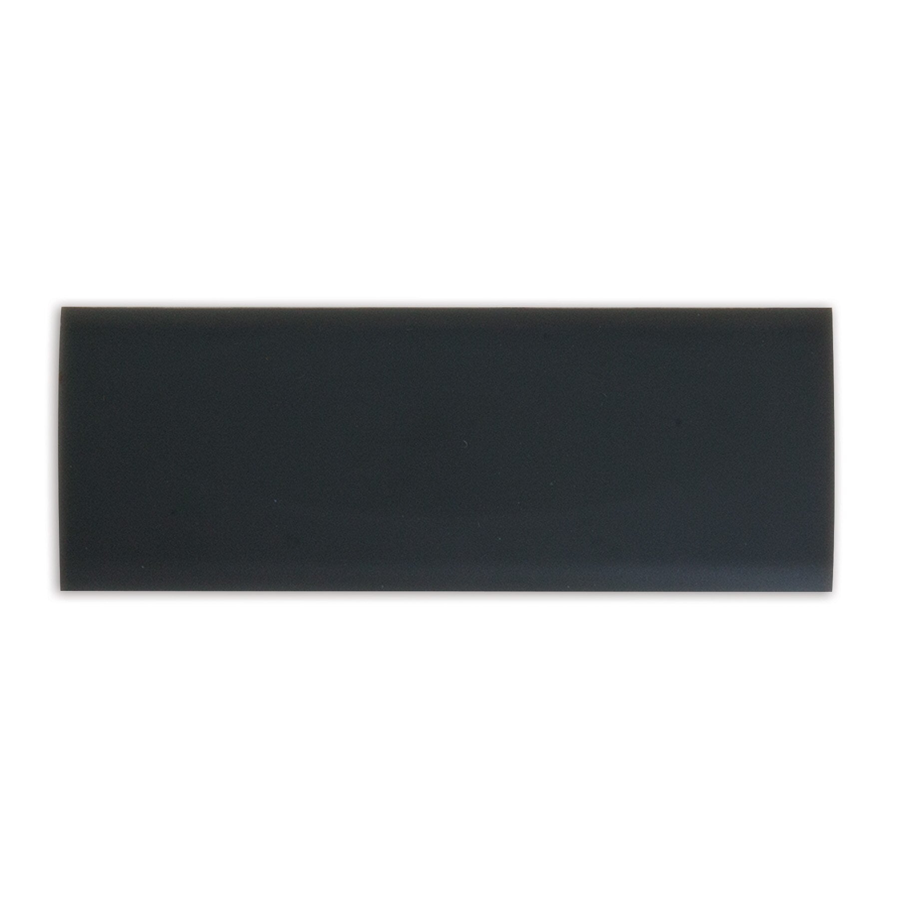 A glossy black rectangular ceramic tile is showcased on a plain white background, mirroring the sleek design of a Pet-mates Long Replacement Latch for Plastic Kennels.