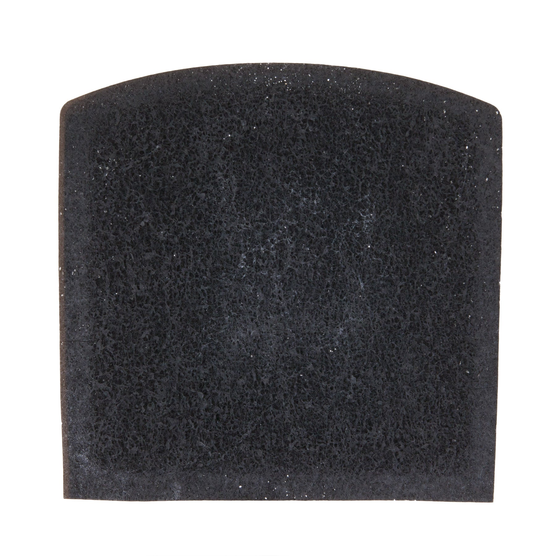 A close-up of a black porous foam sponge, similar to the Pet-mates Zeolite Filter For Jumbo Hooded Litter Pans, shows tiny holes ideal for odor absorption. Its slightly curved top edge stands out against the plain white background, highlighting its Zeolite Charcoal-like texture.