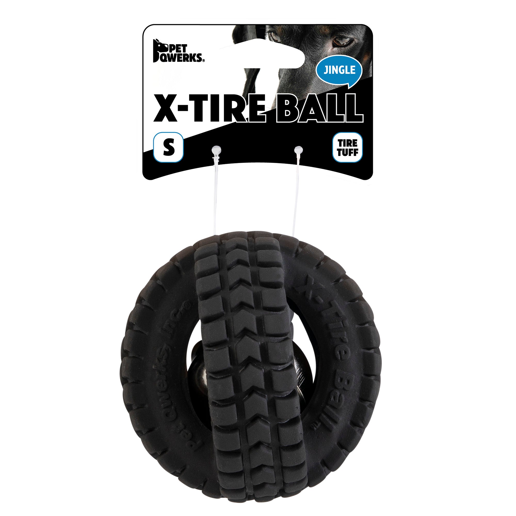 A black rubber dog toy, resembling two interlocked tires, is labeled Pet Qwerks Jingle X-Tire Ball. The packaging features the brand Petqwerks and describes it as a Tire Tuff jingle ball in size S.