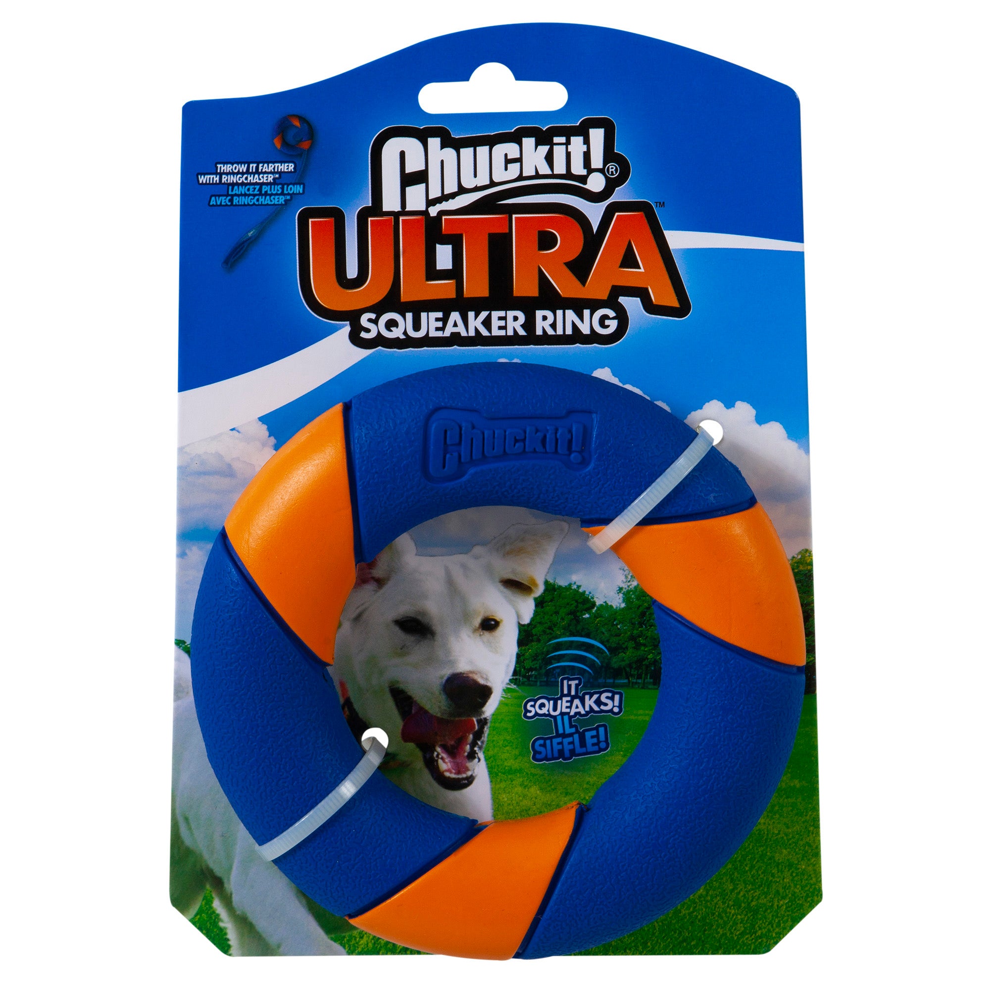 The Chuckit Ultra Squeaker Ring packaging features durable Ultra rubber in vibrant blue and orange with a white leash. A happy dog illustration and It squeaks! text are set against a green grassy backdrop and blue sky, pairing well with the Chuckit RingChaser Launcher.