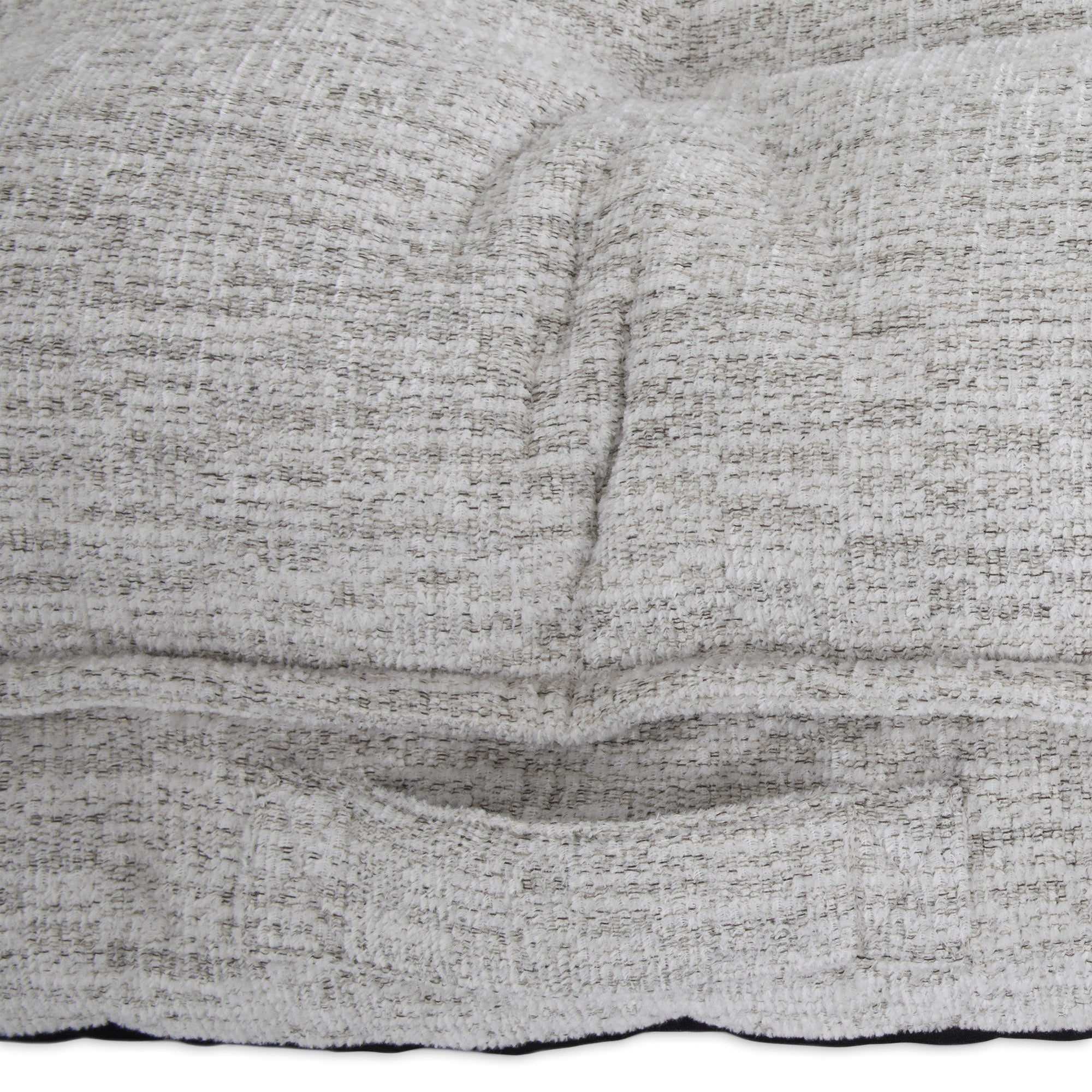Close-up of a light gray textured fabric. The La-Z-Boy Salt & Pepper Cooper Mattress Dog Bed features cushioned, soft, tufted seams for a plush and comfy look ideal for any pets rest.