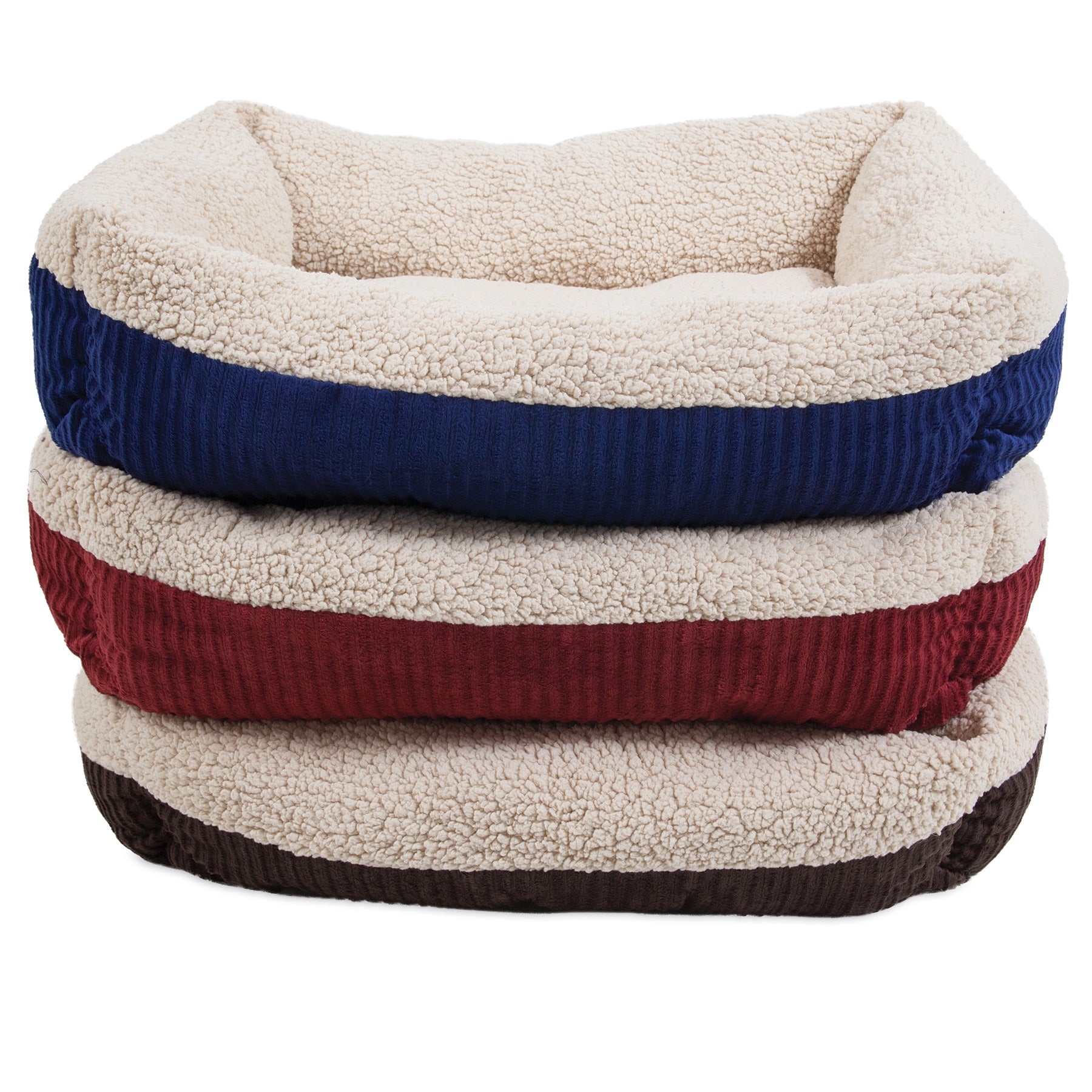 The Aspen Pet Self-Warming Dog Bed features a plush cream lambswool top and three stacked rectangles with outer colors: blue on top, red in the middle, and brown at the base.