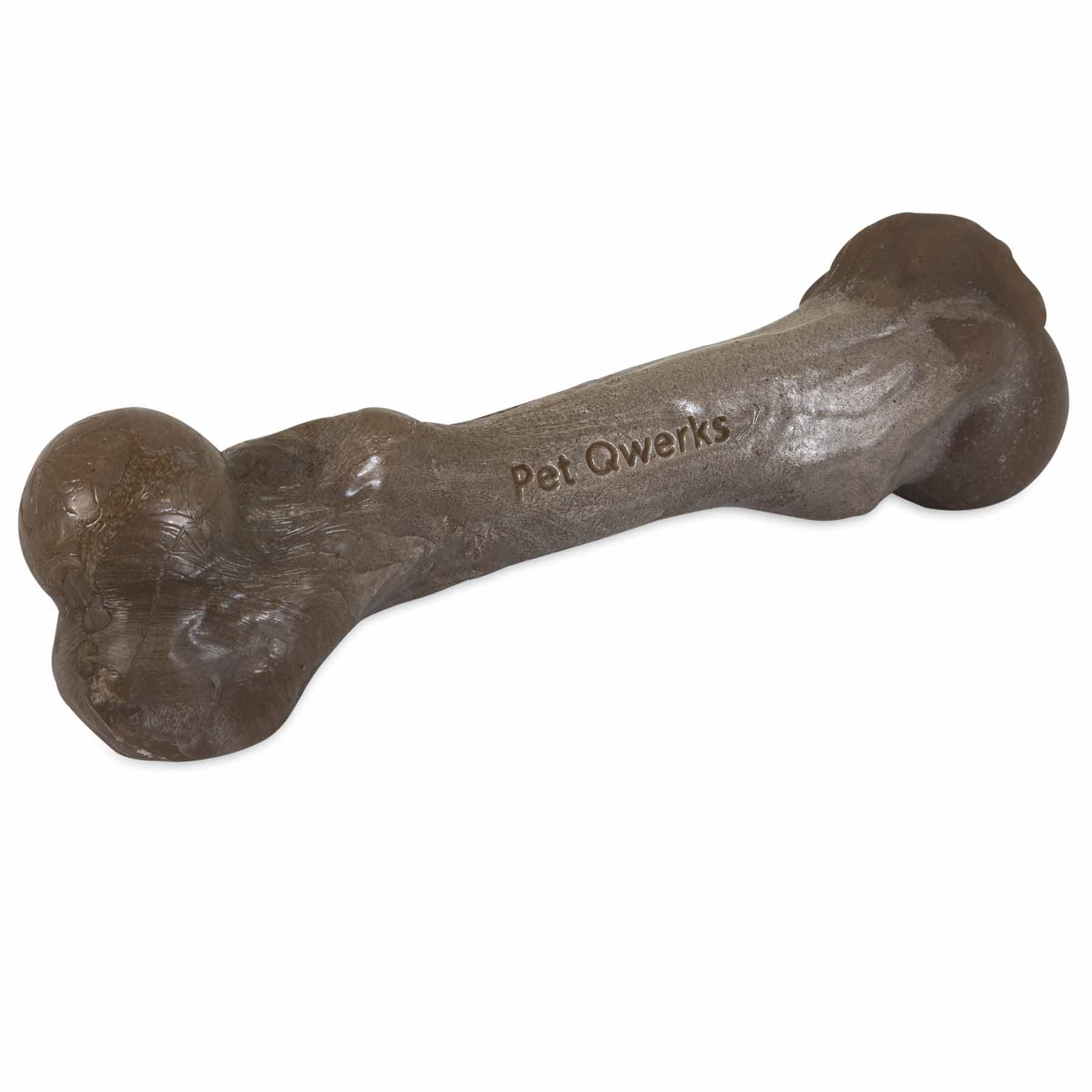 The BarkBone Natural Instincts Zombie Bacon-Infused Nylon Dog Chew is a textured brown dog bone toy with rounded ends and slight gloss, engraved with Pet Qwerks. Made from durable bacon-infused nylon, its perfect to keep your pet entertained.