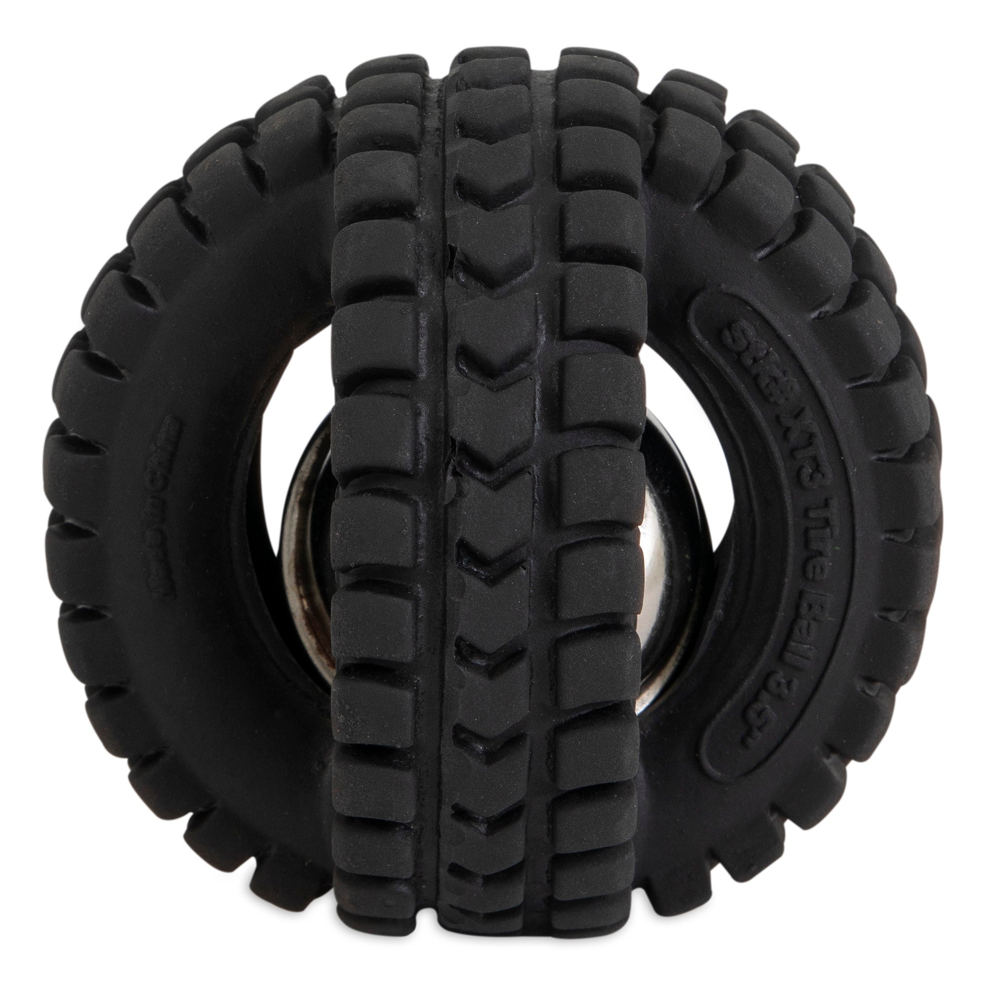 The Petqwerks Jingle X-Tire Ball dog toy has a black rubber tire-like design with grooves and treads. It features two connected tires with a visible silver jingle ball in between for extra fun.