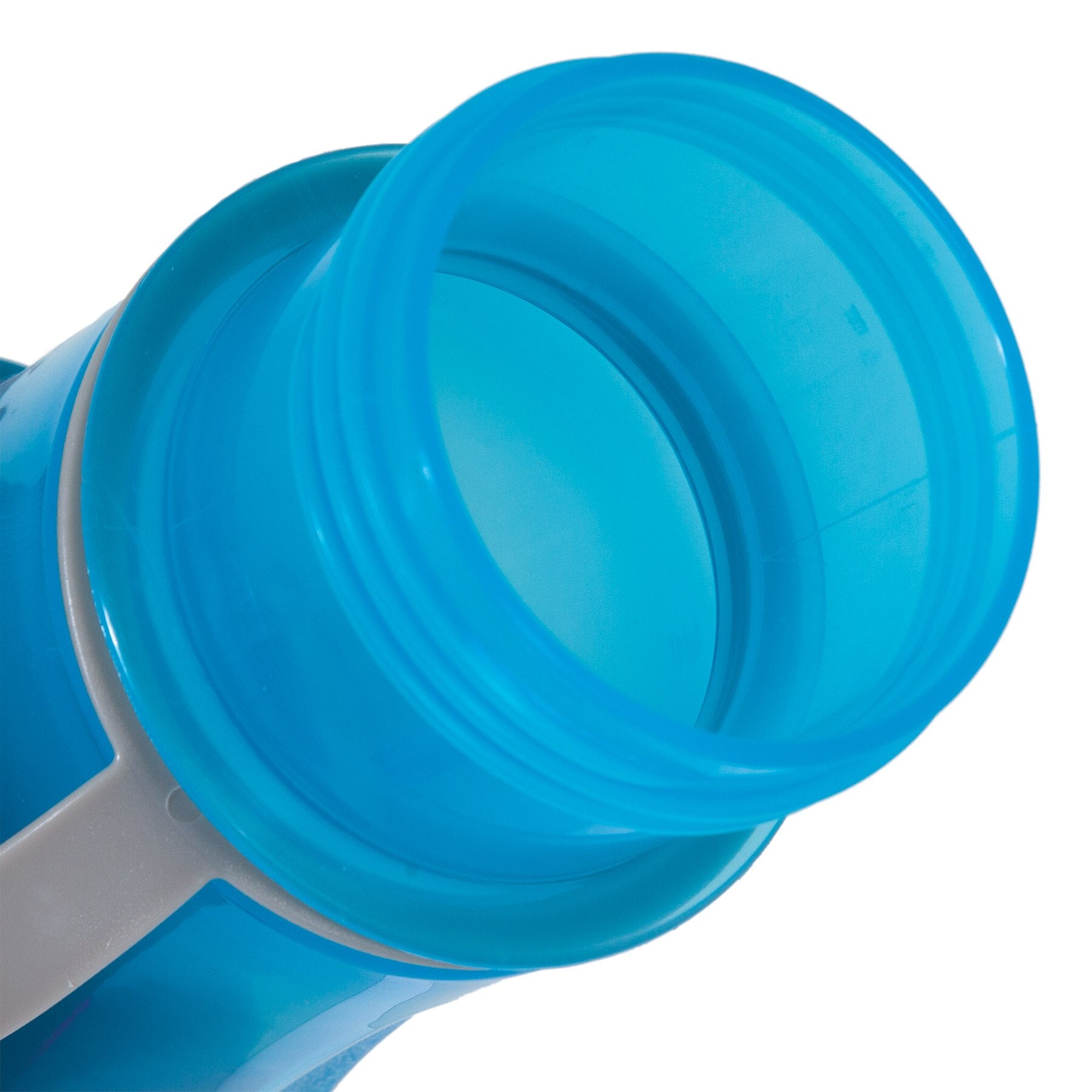 A close-up of the open Pet-mates Blue Replendish To-Go Travel Water Bottle, featuring a wide mouth and translucent hue. The bottle has a textured grip and sleek design, perfect for pet travel hydration, and comes with a removable water bowl.