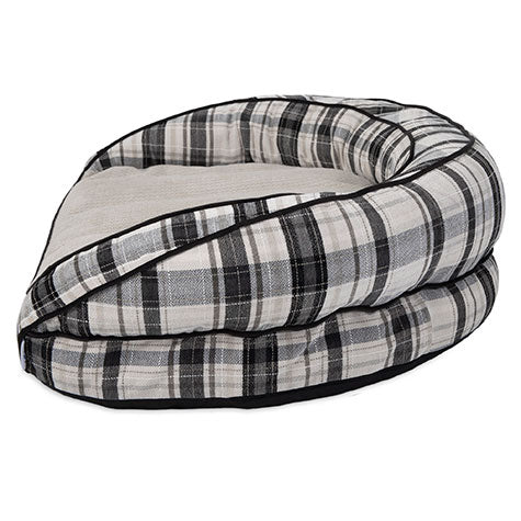 The La-Z-Boy Harper Sofa Dog Bed has high, cushioned sides with a black, white, and gray plaid design. Its beige center uses Comfort Select fiber-fill for extra warmth and comfort. Machine washable for easy maintenance.