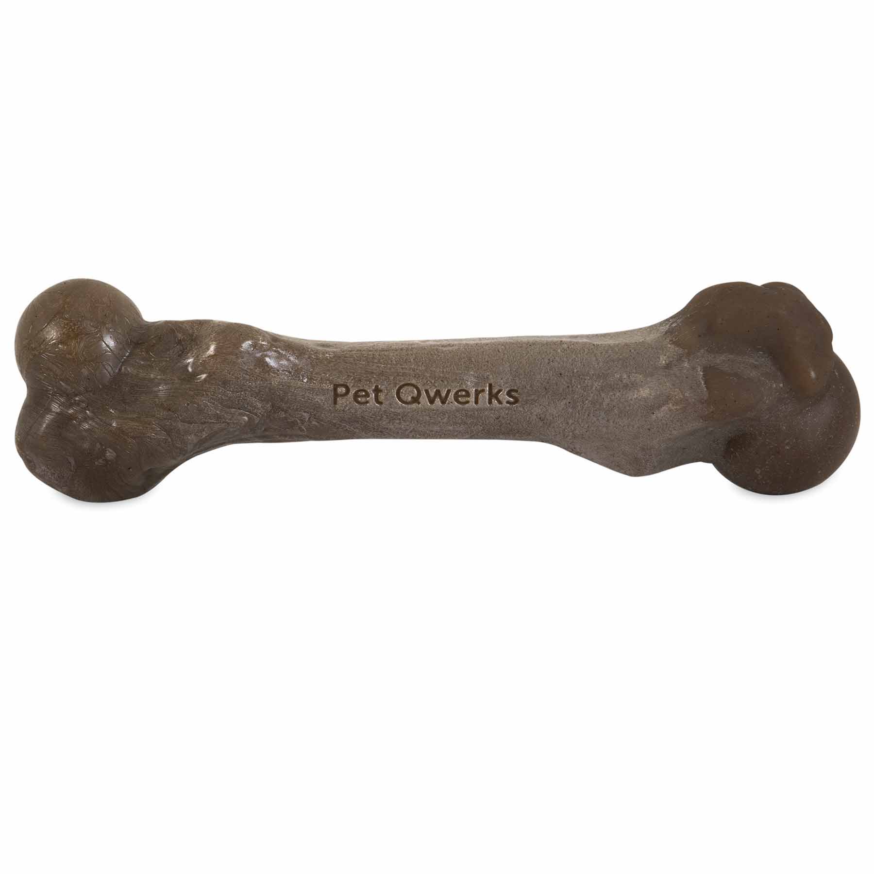 A large, brown BarkBone Natural Instincts Zombie Bacon-Infused Nylon Dog Chew features a Pet Qwerks imprint on its textured surface. This durable chew toy resembles a real bone with rounded ends, perfect for satisfying your pets chewing instincts.