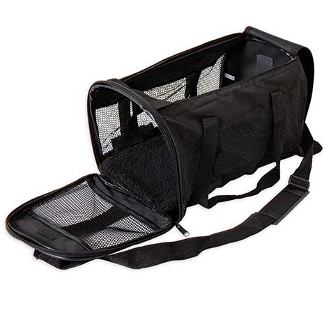 The Pet-mates Soft Sided Kennel Cab, a black mesh carrier lying on its side, is perfect for airline travel with a zippered flap, shoulder strap, top handle, and cushioned interior for small animals.